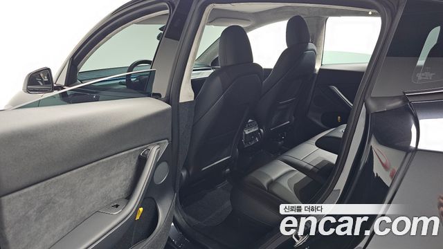 Tesla Model Y 2024 — photo 18