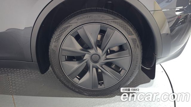 Tesla Model Y 2024 — photo 7