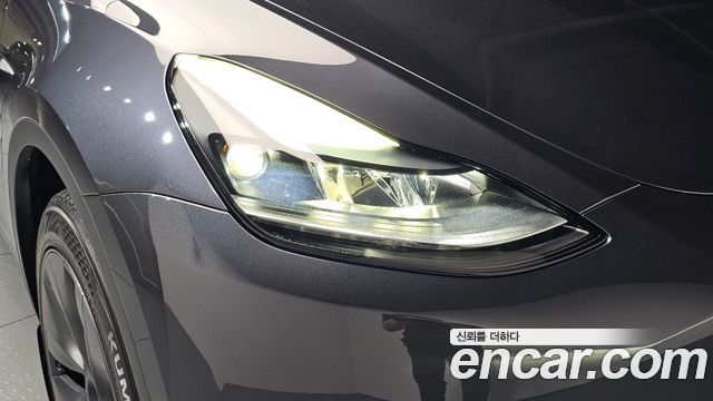 Tesla Model Y 2024 — photo 8