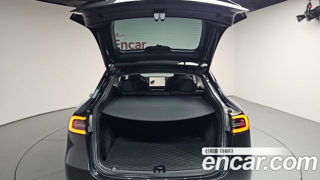 Tesla Model Y 2024 — photo 33