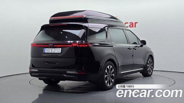 Kia Canival 2021 — photo 2