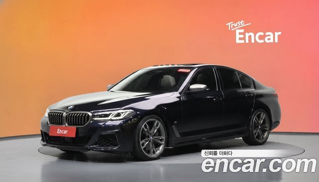 BMW 5-Series 2022 — photo 1