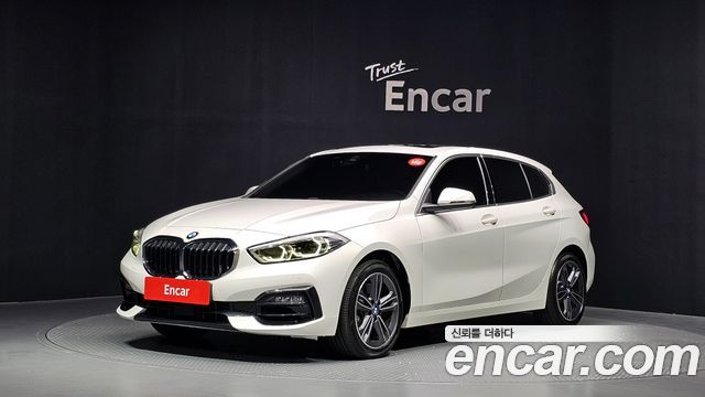 BMW 1-Series 2022 — photo 1