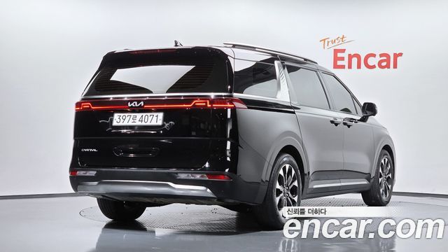 Kia Canival 2023 — photo 2