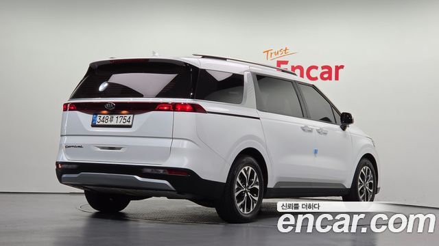 Kia Canival 2021 — photo 2