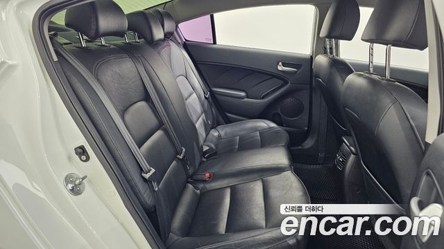 Kia K3 2014 — photo 18