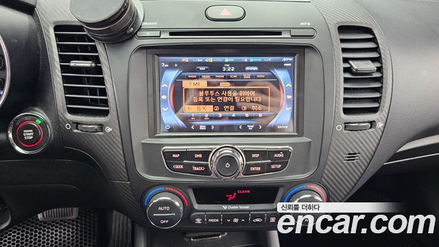 Kia K3 2014 — photo 20