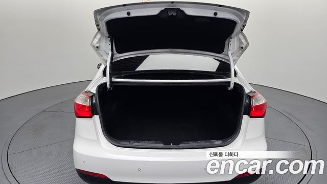 Kia K3 2014 — photo 26