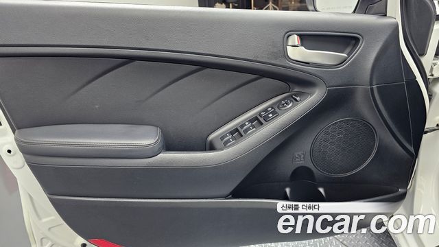 Kia K3 2014 — photo 14