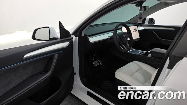 Tesla Model Y 2024 — photo 13