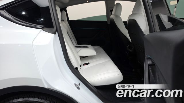 Tesla Model Y 2024 — photo 17