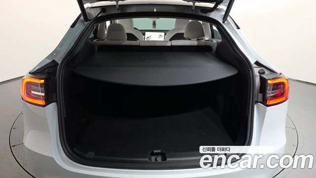 Tesla Model Y 2024 — photo 23