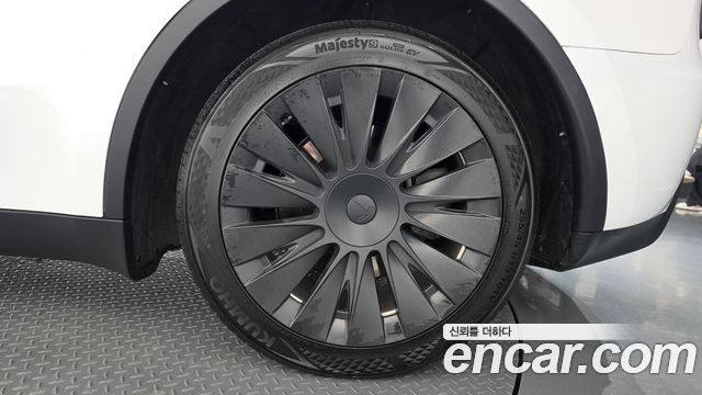 Tesla Model Y 2024 — photo 7