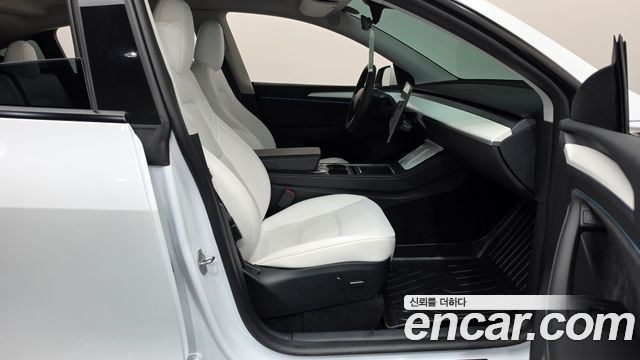 Tesla Model Y 2024 — photo 16