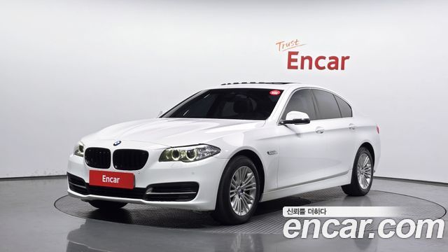 BMW 5-Series 2014 — photo 1