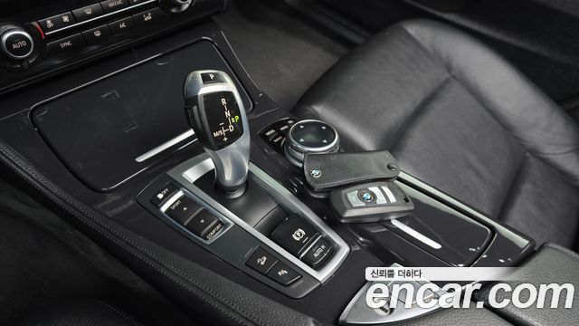 BMW 5-Series 2014 — photo 9