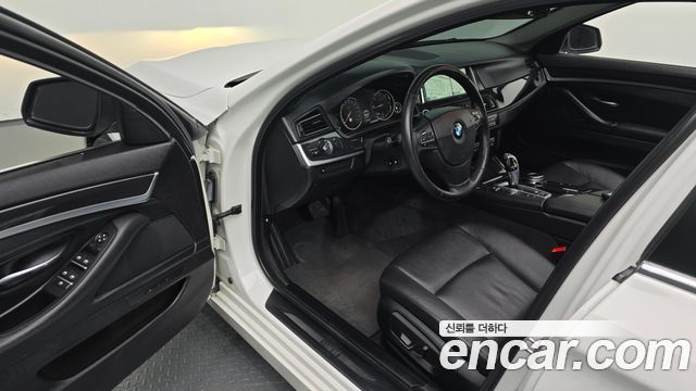 BMW 5-Series 2014 — photo 10