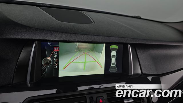 BMW 5-Series 2014 — photo 14