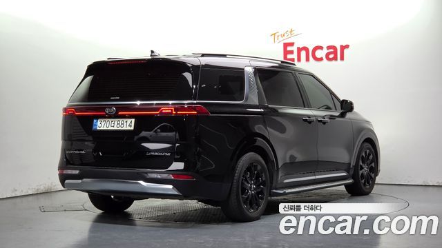 Kia Canival 2021 — photo 2