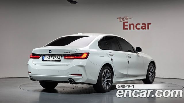 BMW 3-Series 2024 — photo 2