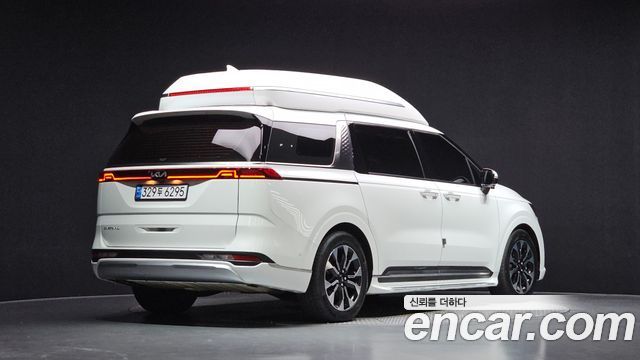 Kia Canival 2023 — photo 2