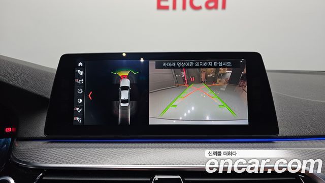 BMW 5-Series 2018 — photo 15