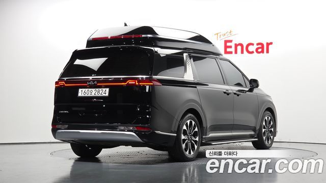 Kia Canival 2023 — photo 2