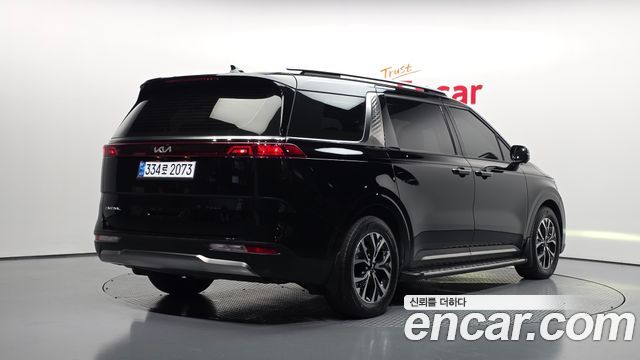 Kia Canival 2023 — photo 2