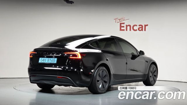 Tesla Model 3 2024 — photo 2