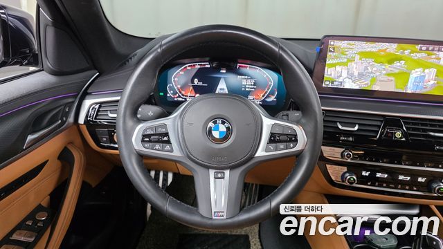 BMW 5-Series 2023 — photo 20