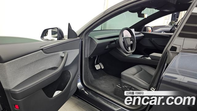 Tesla Model Y 2026 — photo 13