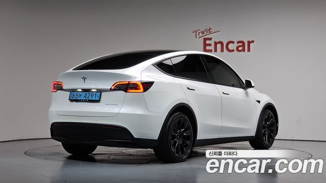 Tesla Model Y 2021 — photo 2