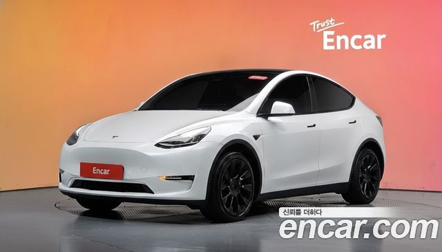 Tesla Model Y 2021 — photo 1