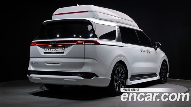 Kia Canival 2023 — photo 2