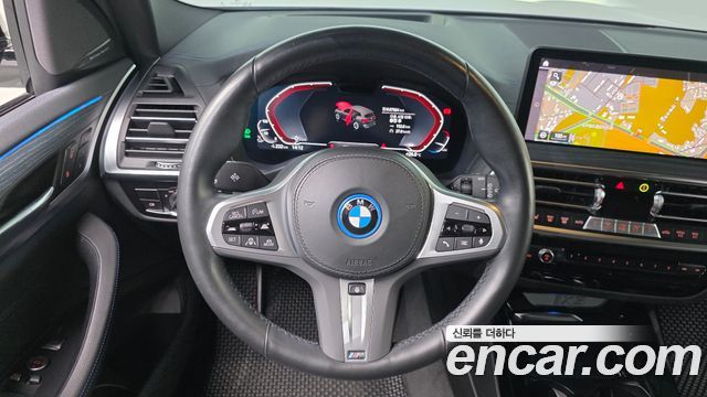 BMW iX3 2024 — photo 12