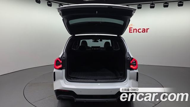 BMW iX3 2024 — photo 18