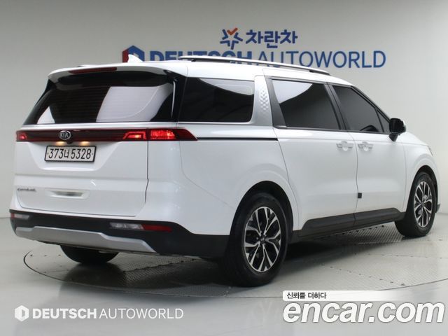 Kia Canival 2021 — photo 2