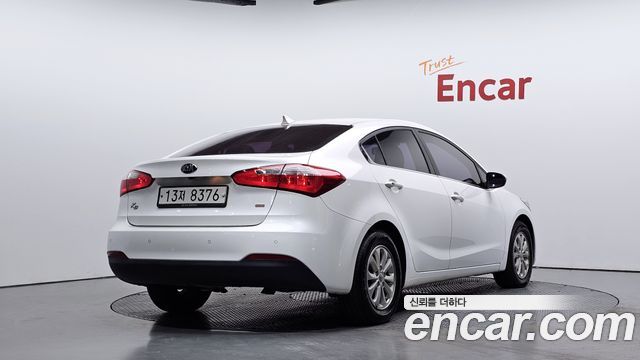 Kia K3 2013 — photo 2