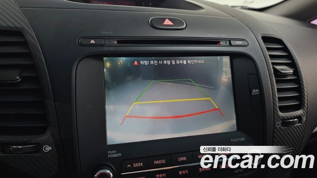 Kia K3 2013 — photo 21