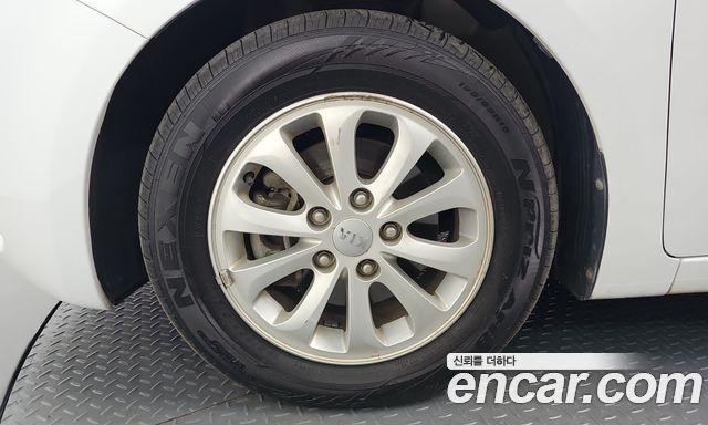 Kia K3 2013 — photo 32