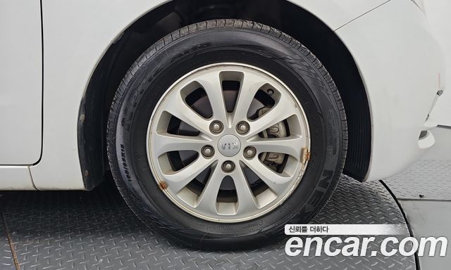 Kia K3 2013 — photo 33