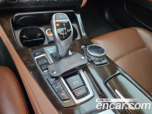 BMW 5-Series 2014 — photo 8