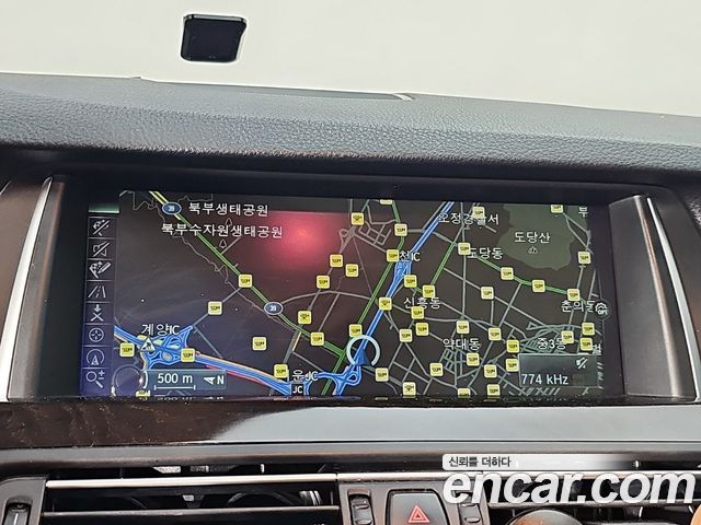 BMW 5-Series 2014 — photo 14