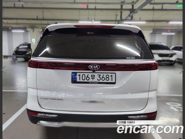 Kia Canival 2021 — photo 2