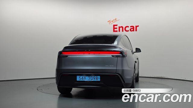 Tesla Model Y 2025 — photo 4