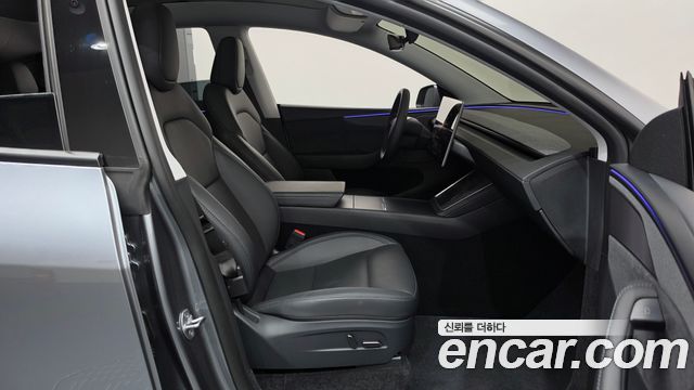 Tesla Model Y 2025 — photo 16