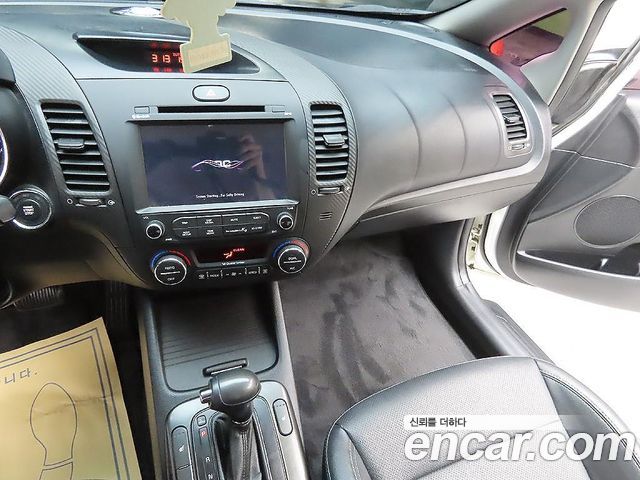 Kia K3 2013 — photo 7