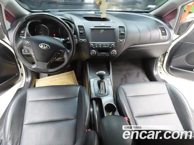 Kia K3 2013 — photo 11