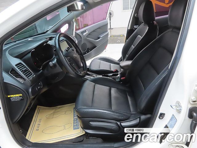 Kia K3 2013 — photo 12
