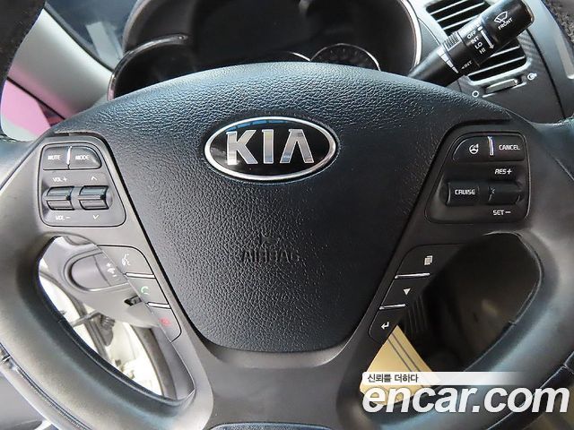 Kia K3 2013 — photo 14